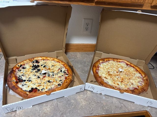 2 Large 2 Topping Pizzas.